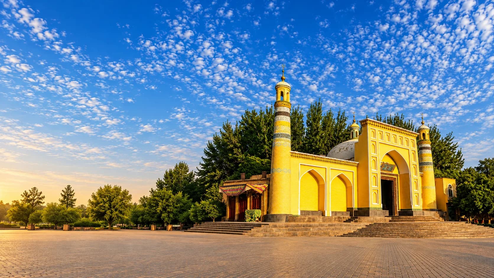 Historic Silk Road trading street in Central Asia at sunset with caravans, minarets, and ancient merchants